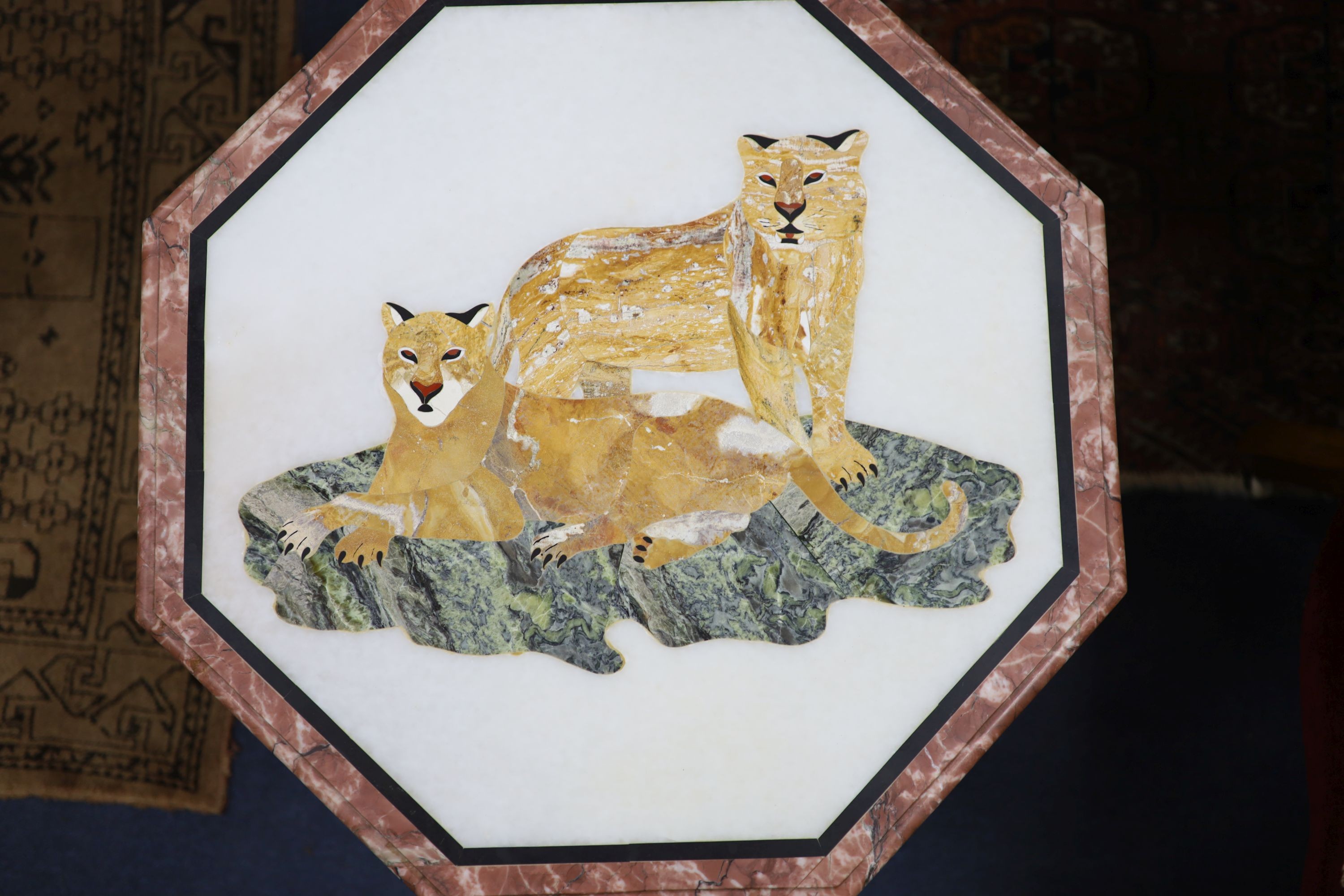 An octagonal hardstone inlaid occasional table, width 57cm, height 47cm